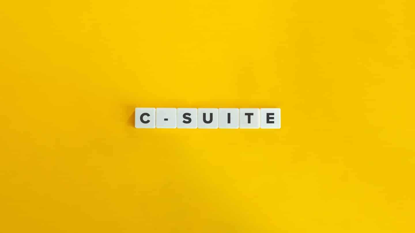 C-suite Block Letters On Bright Orange Background