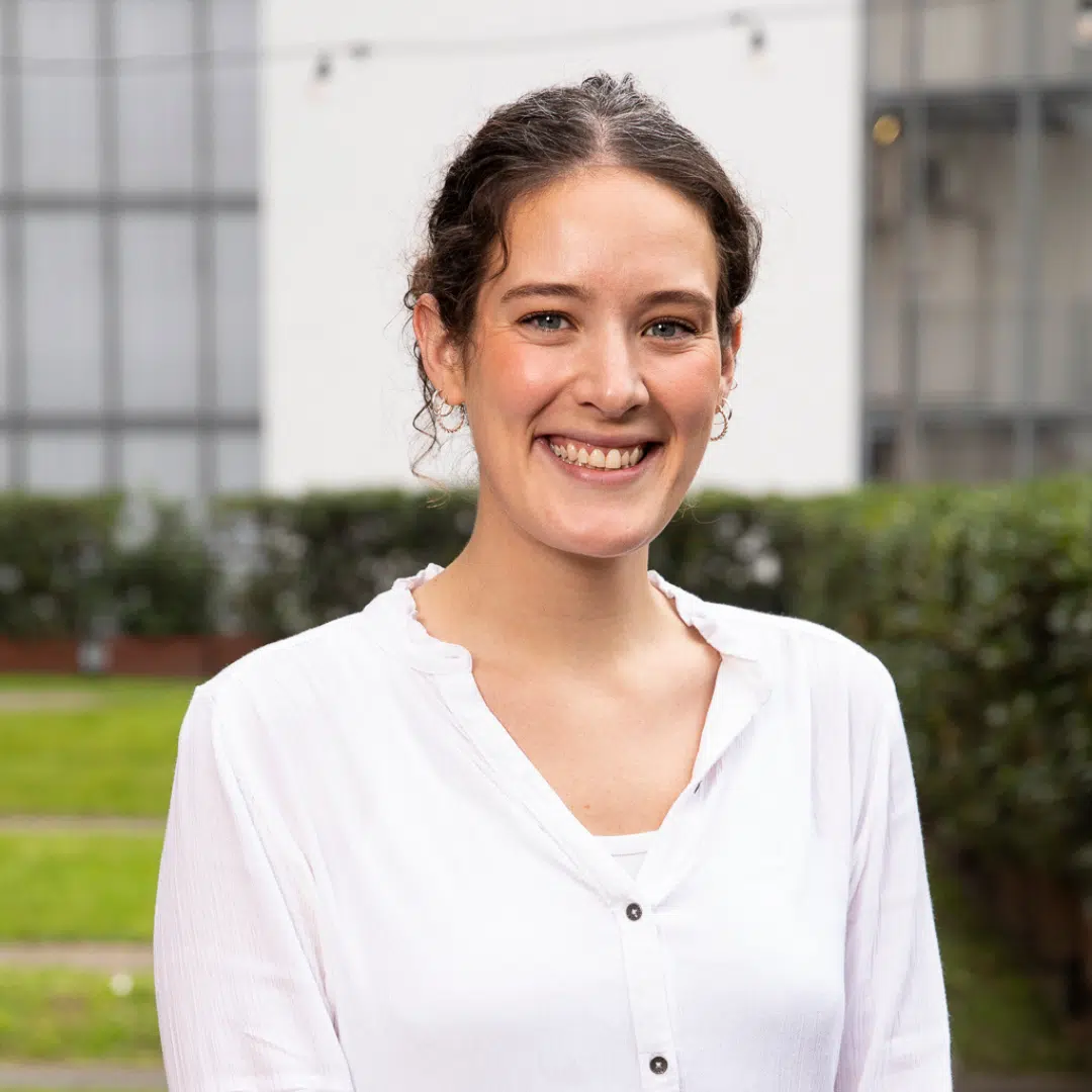 Woman smiling for her headshot