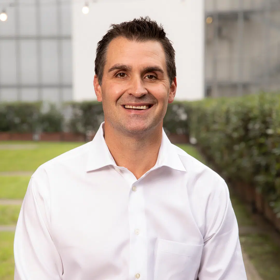 Man smiling for his headshot