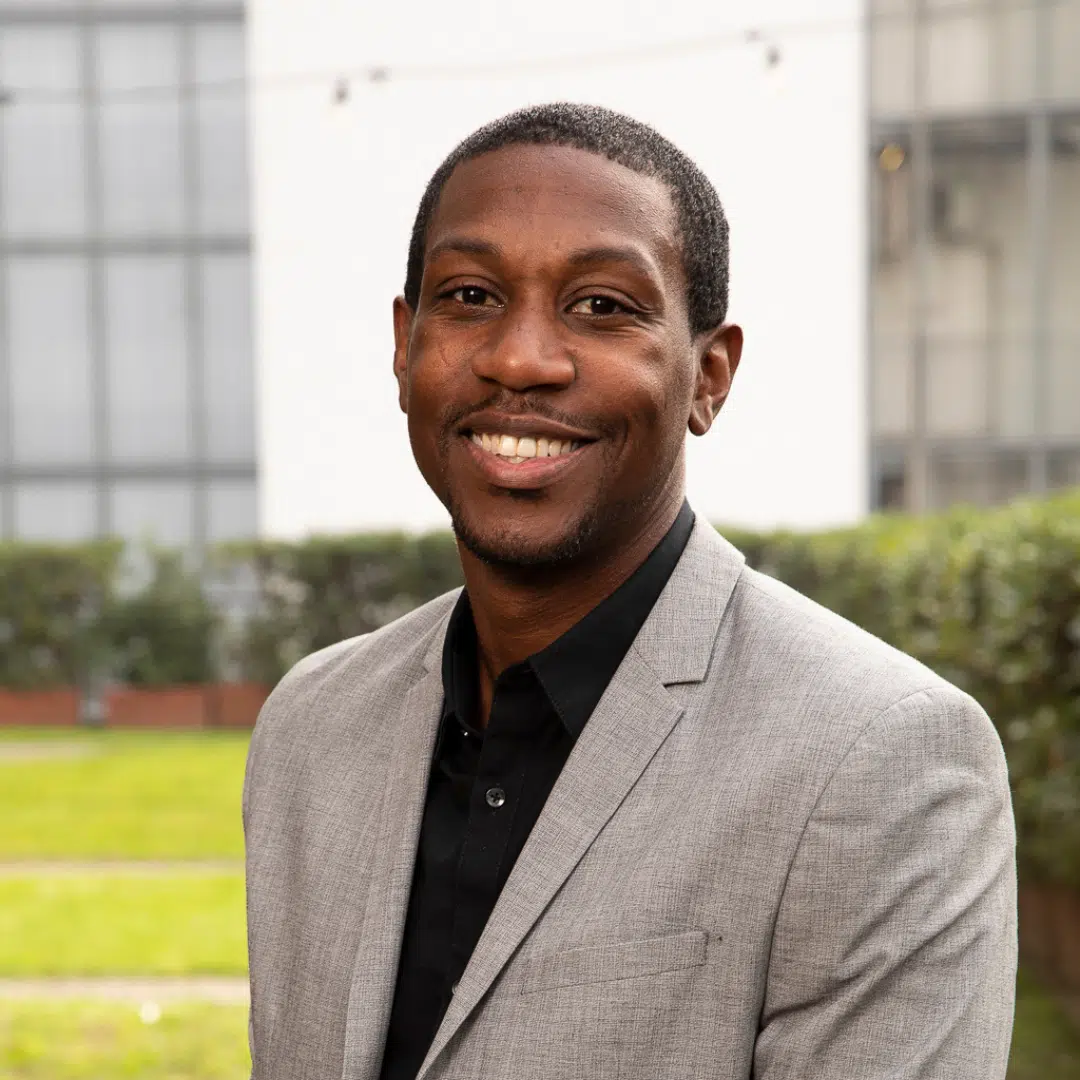 Man smiling for his headshot