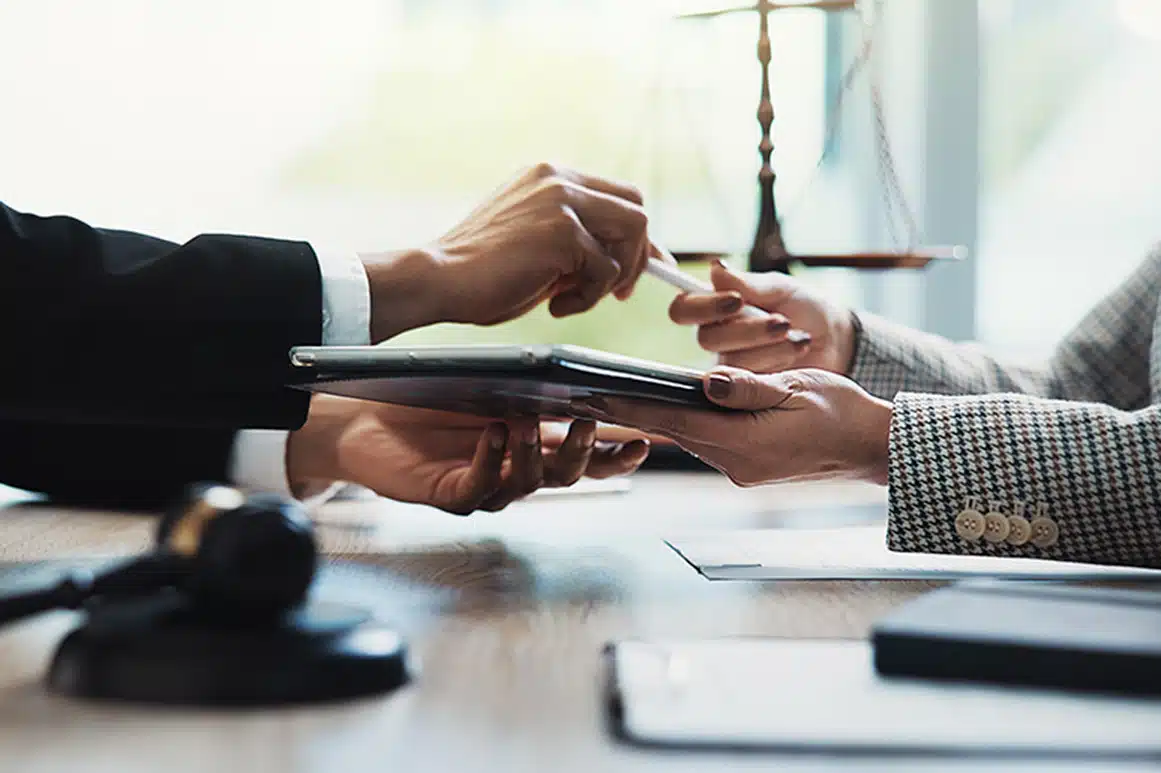 Lawyers discussing record in CRM