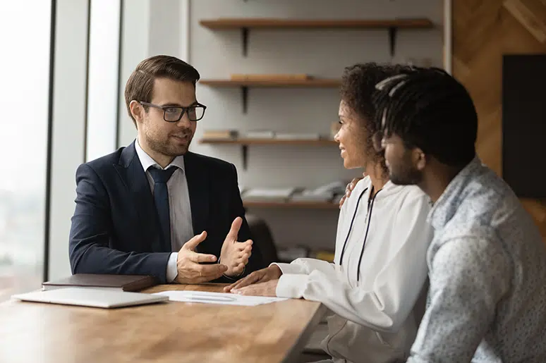 Financial advisor meeting with clients