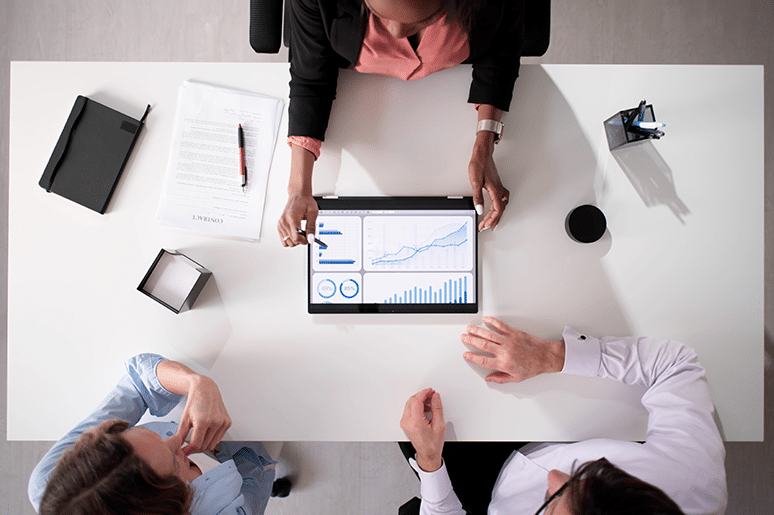 Financial services professionals discussing marketing strategy