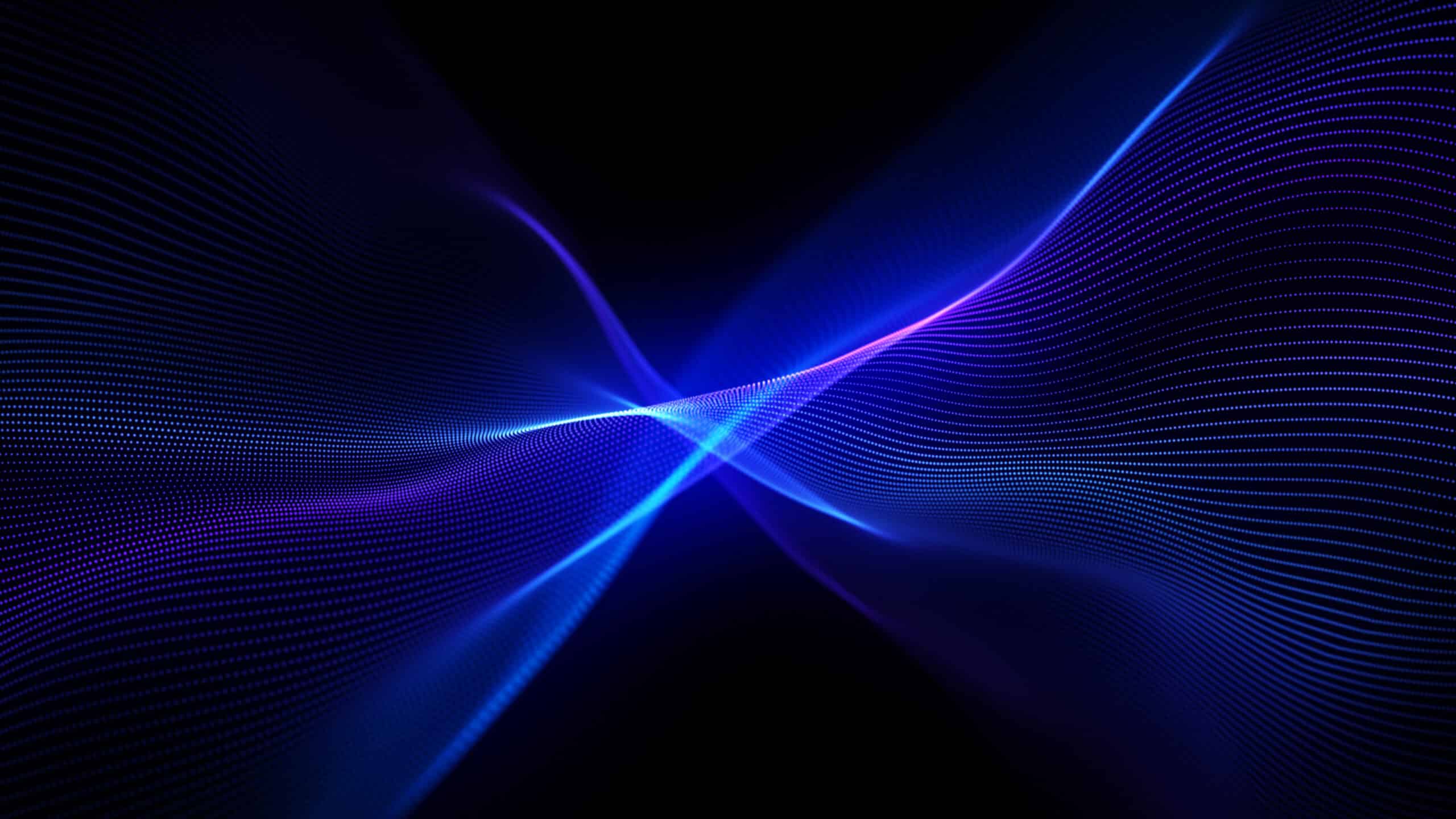 Abstract hero image with blue light rays emanating from the center on a black background, evoking technology, innovation, and enterprise transformation.