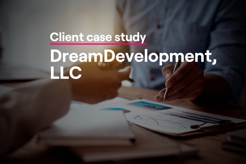 Close-up of hands reviewing data charts and graphs on paper, illustrating relationship intelligence analysis in DreamDevelopment, LLC's Altrata case study